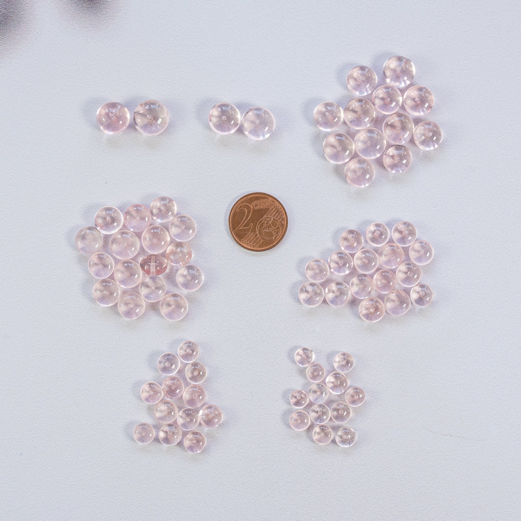 Perles rondelles lisses de Quartz rose de 6 à 10 mm ( lot de 2 )