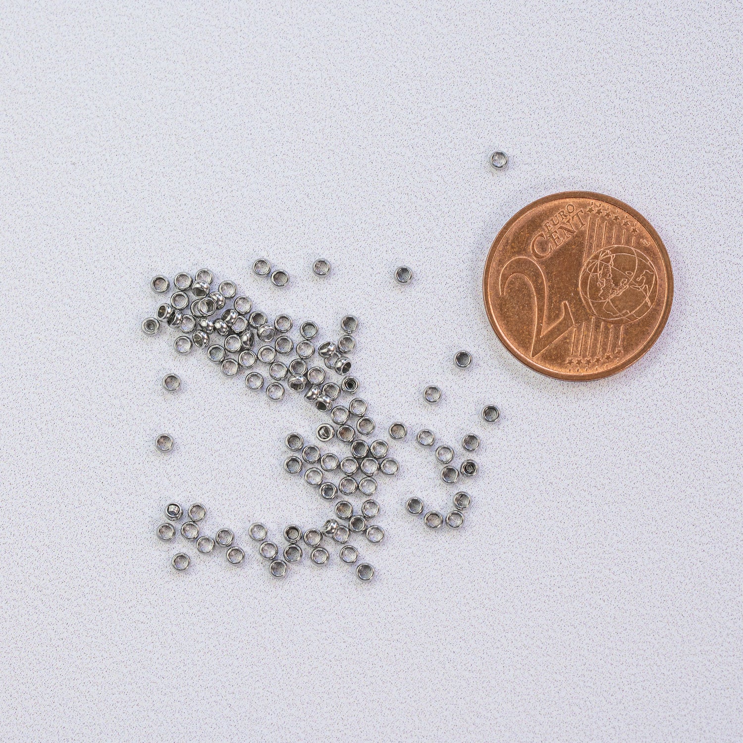 Perles à écraser/sertir en acier inoxydable chirurgical de 1,9 x 0,9 mm ( lot de 10 )