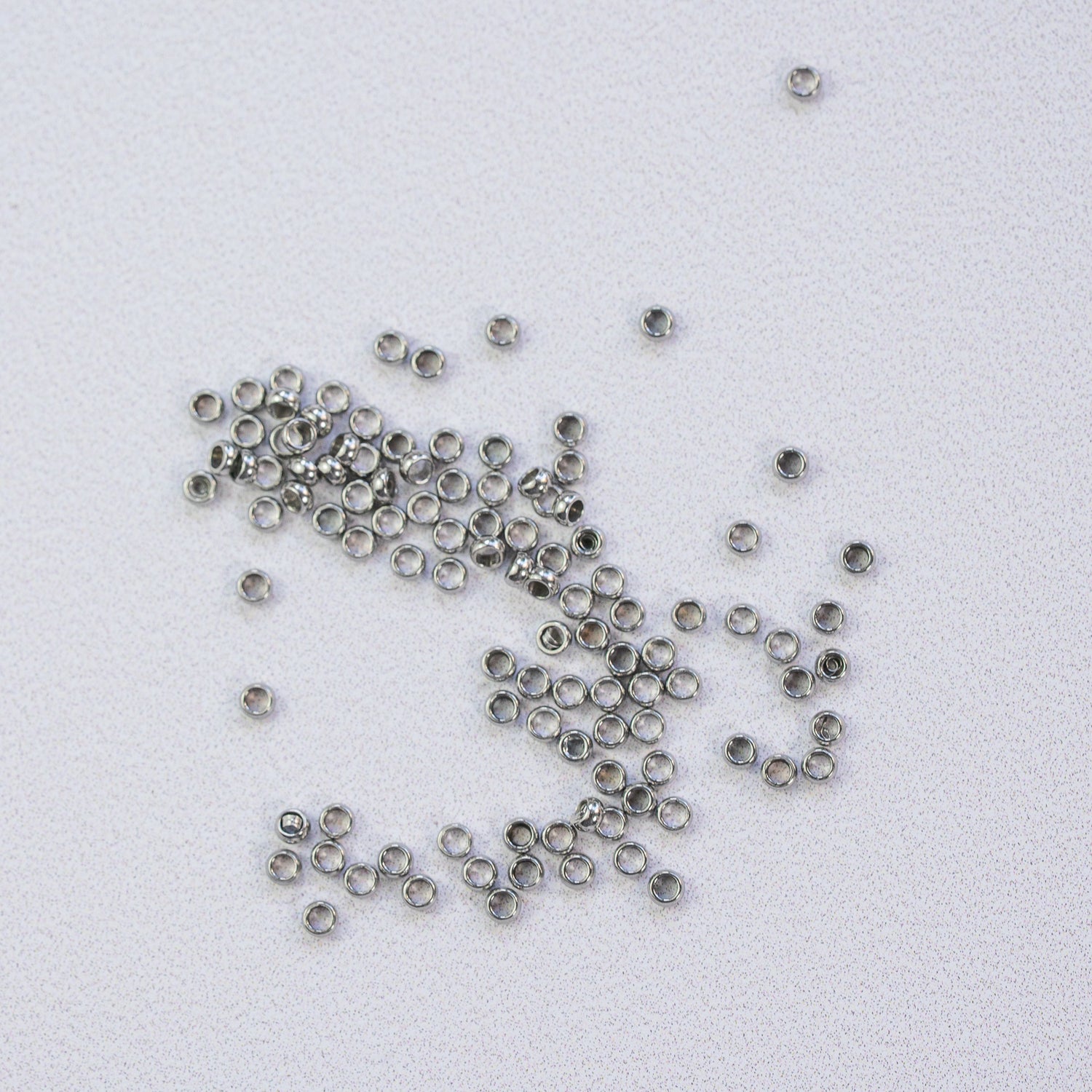 Perles à écraser/sertir en acier inoxydable chirurgical de 1,9 x 0,9 mm ( lot de 10 )