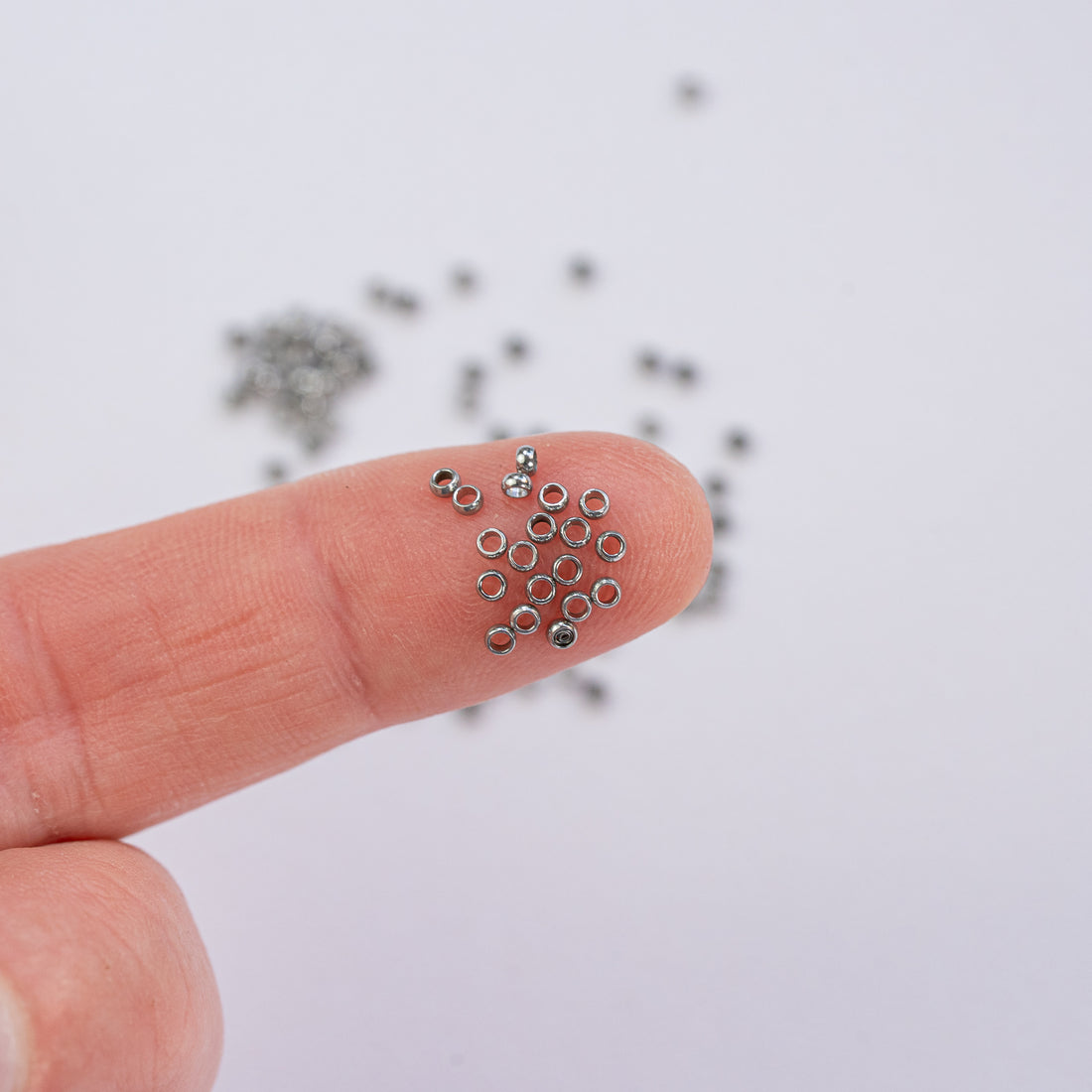 Perles à écraser en acier inoxydable chirurgical de 1,9 x 0,9 mm ( lot de 10 )