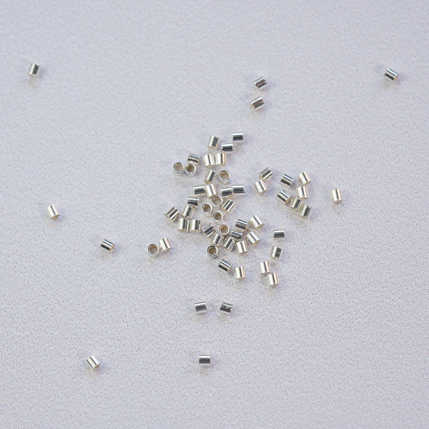 Perles à écraser/sertir en argent 925 de 1,4 x 1,4 mm ( lot de 2 )