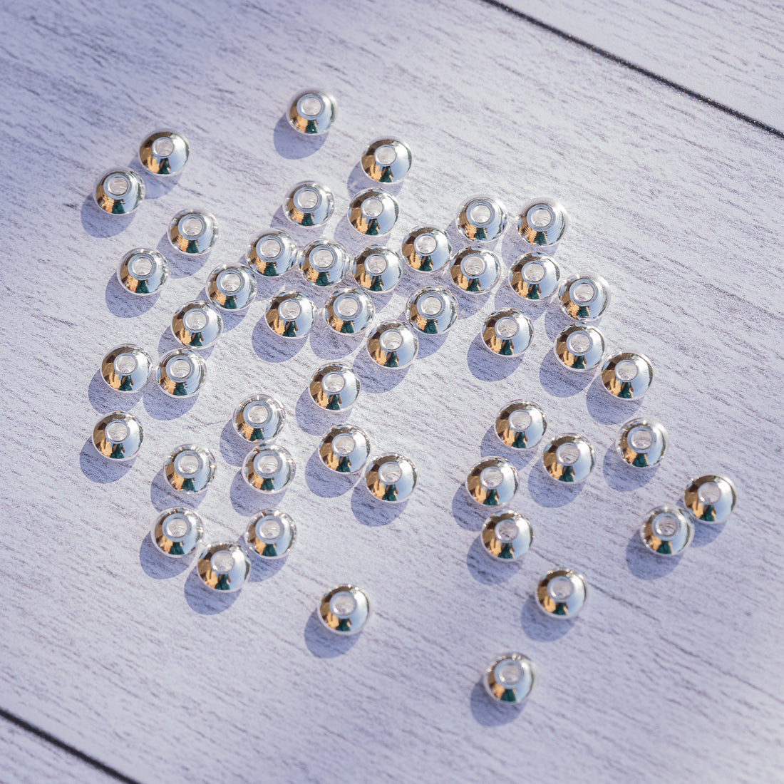 Perles rondelles toupies en acier inoxydable argenté de 6 x 3 mm ( lot de 4 )