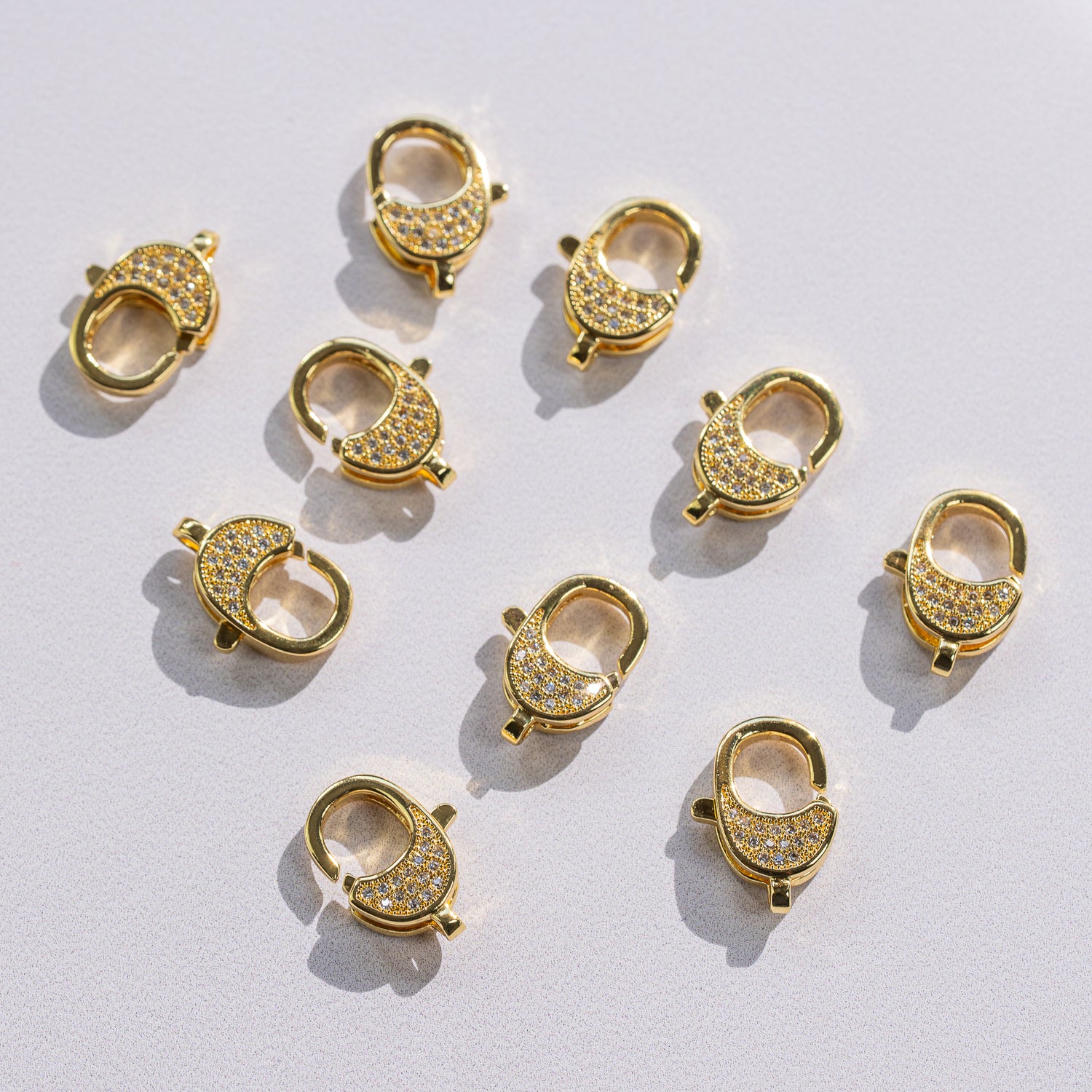 Fermoirs mousqueton ovales en laiton plaqué or 18k et zirconium de 16,5 mm ( à l&