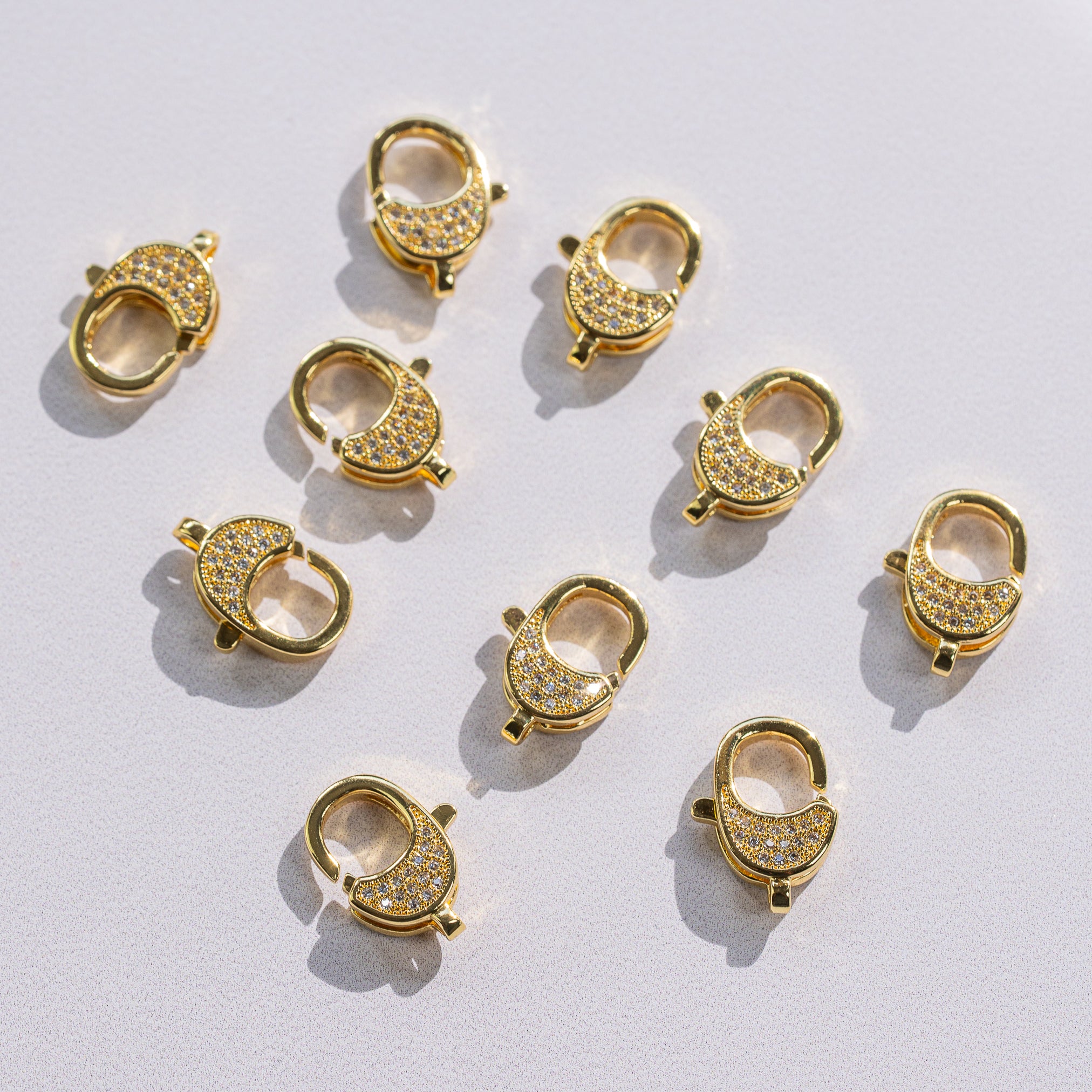 Fermoirs mousqueton ovales en laiton plaqué or 18k et zirconium de 16,5 mm ( à l&