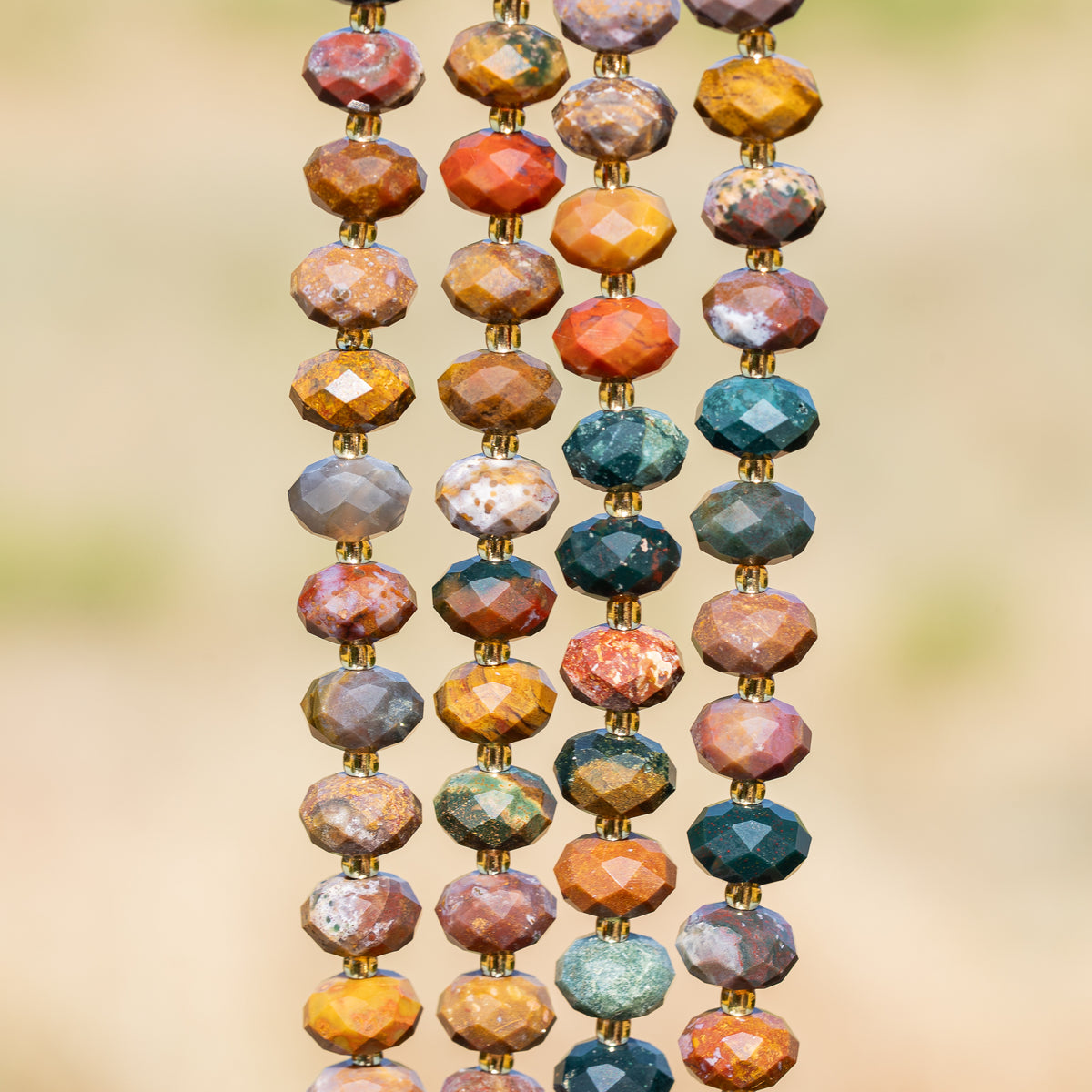 Perles rondelles facettes de Jaspe océan de 10 x 6,5 mm ( 1/2 rang de env 21/22 perles )