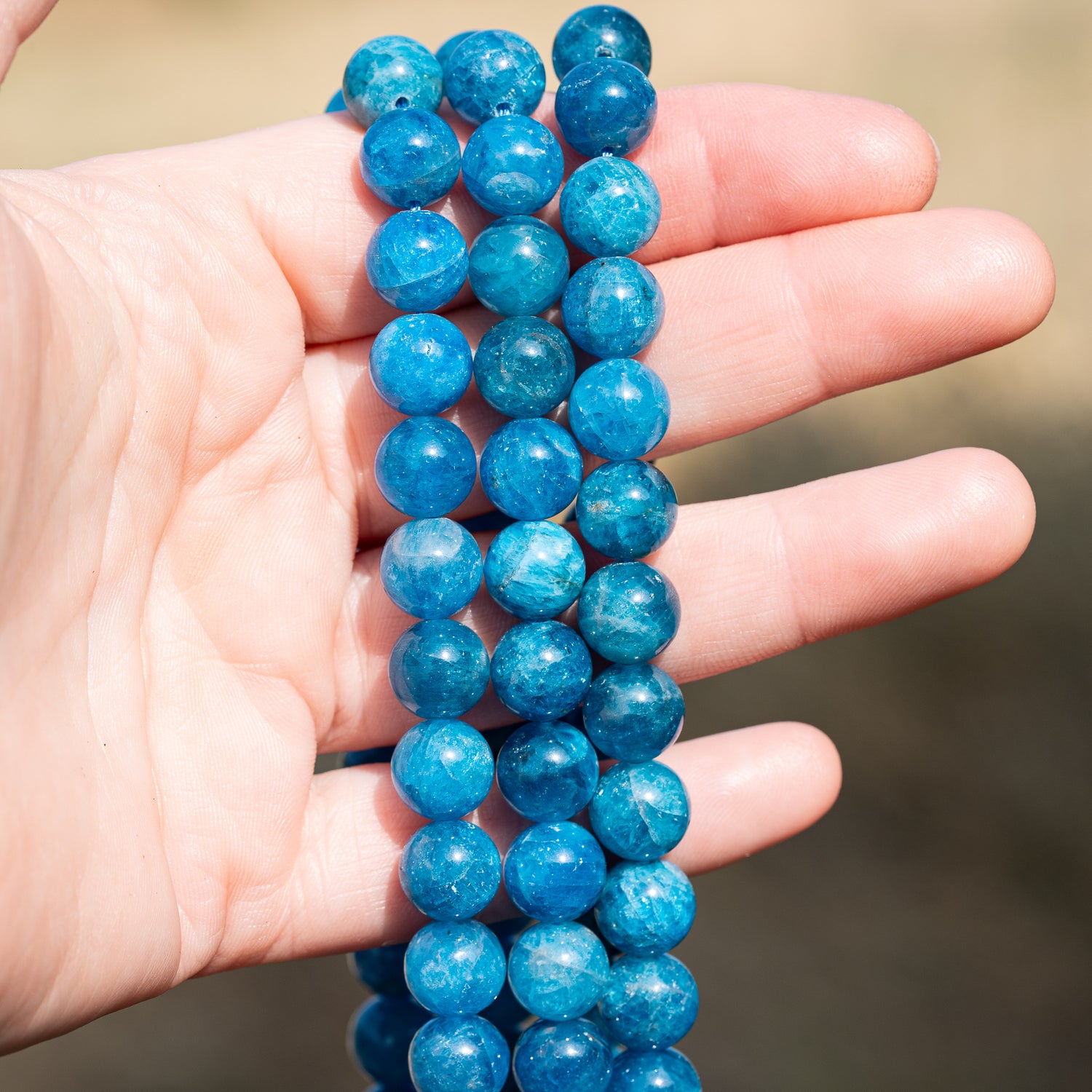 Perles rondes lisses en Apatite bleue de 10 mm ( lot de 10 perles )