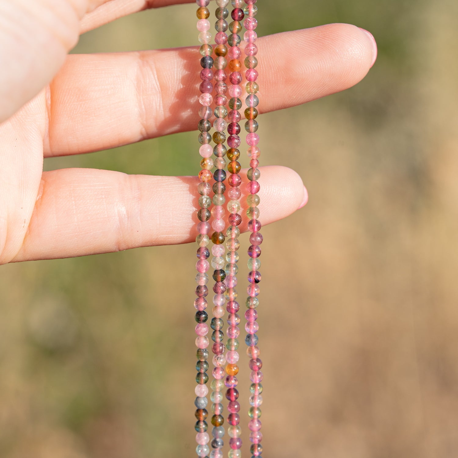 Perles rondes lisses de Tourmamine multicolore de 2,6 mm ( rang de env 152 perles )