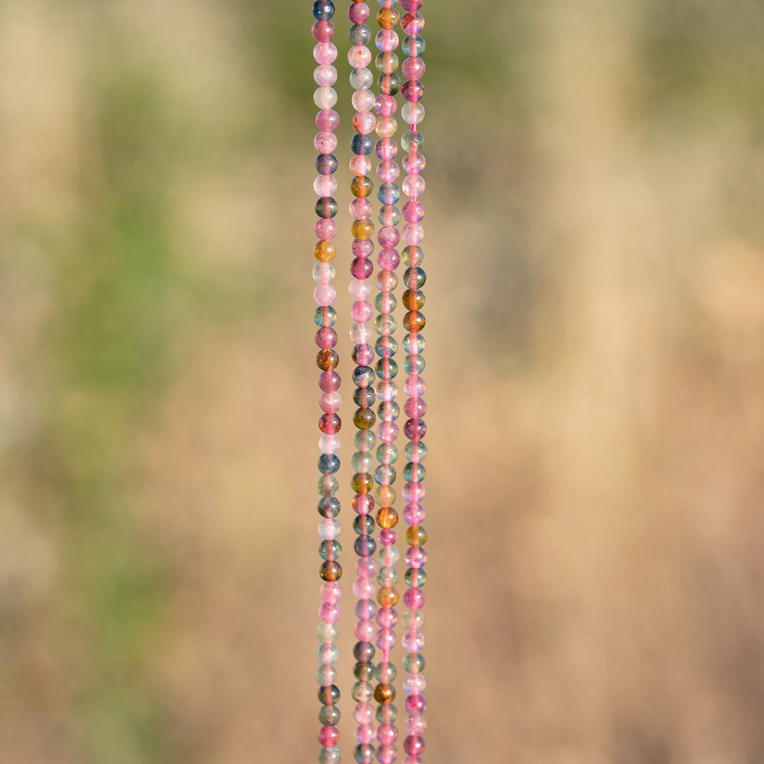 Perles rondes lisses de Tourmamine multicolore de 2,6 mm ( rang de env 152 perles )