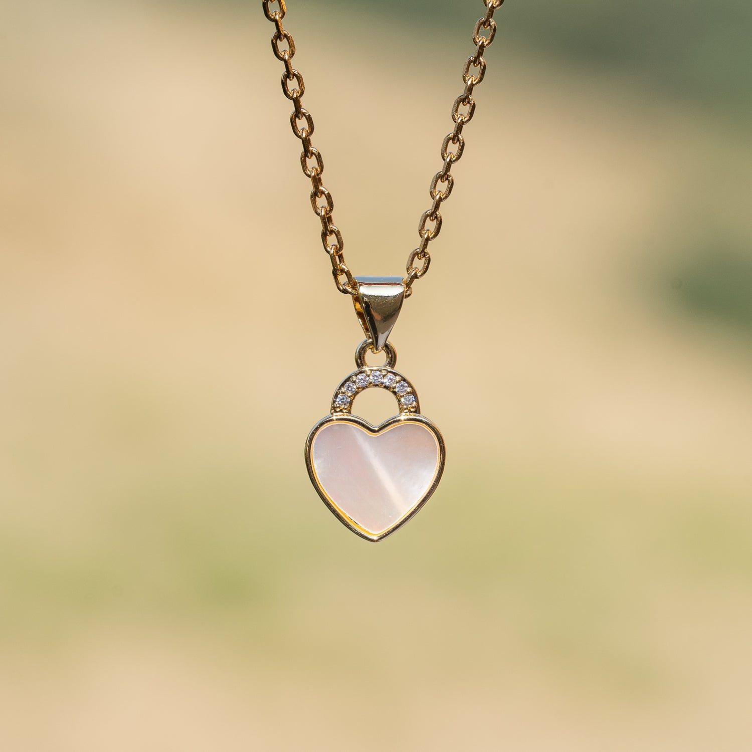 Breloques coeur en nacre, laiton plaqué or 16k et zirconium de 16 mm ( à l&