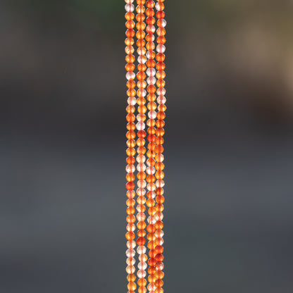 Perles rondes facettes de Cornaline de 2,2 mm ( rang de env 196 perles )