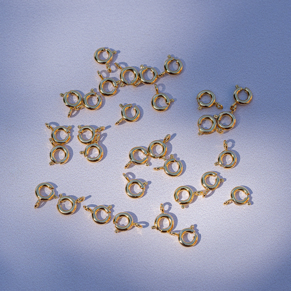 Fermoir ronds à ressort en laiton plaqué or 18k de 6 mm ( à l&