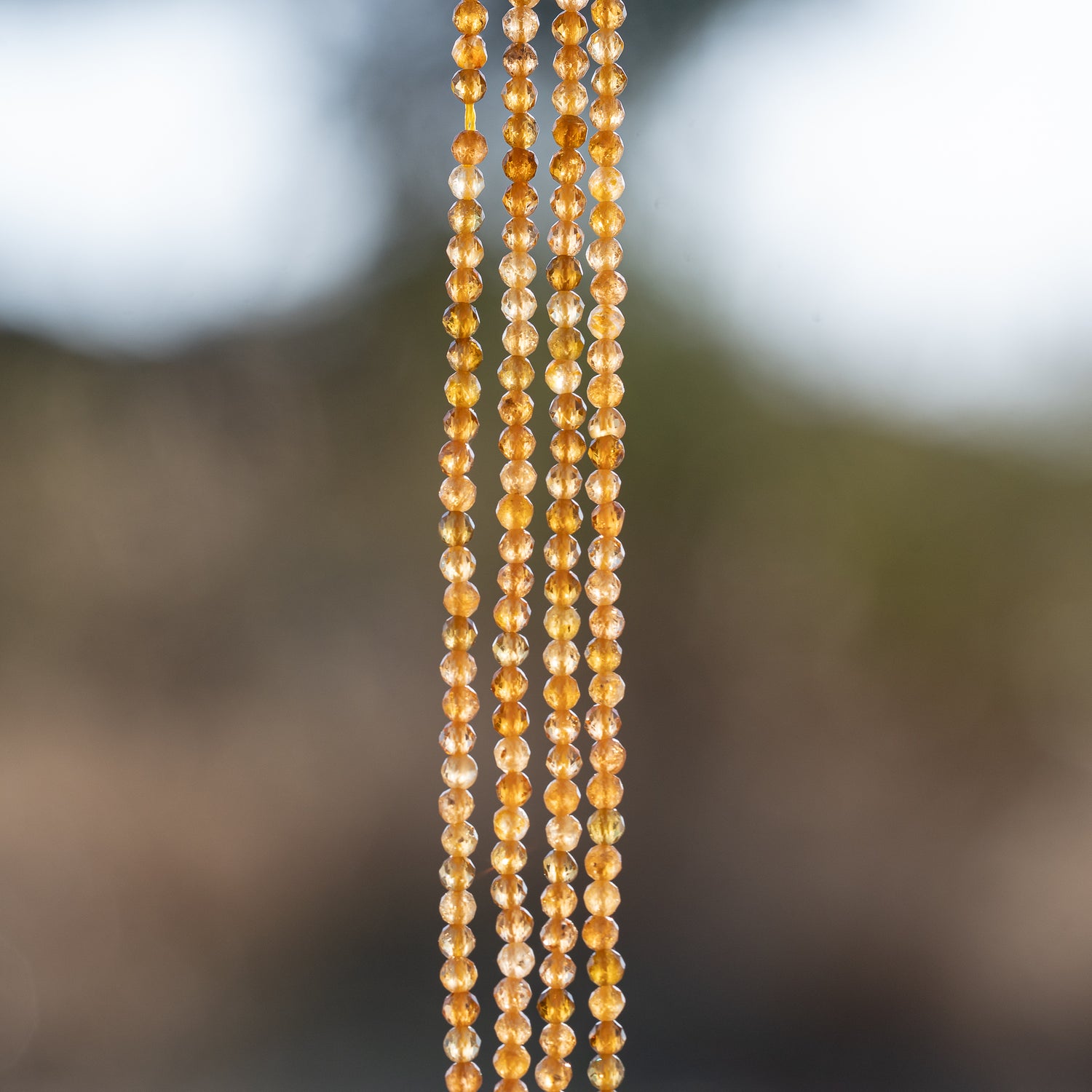 Perles rondes facettes de Tourmaline jaune de 2,5 mm ( rang de env 172 perles )