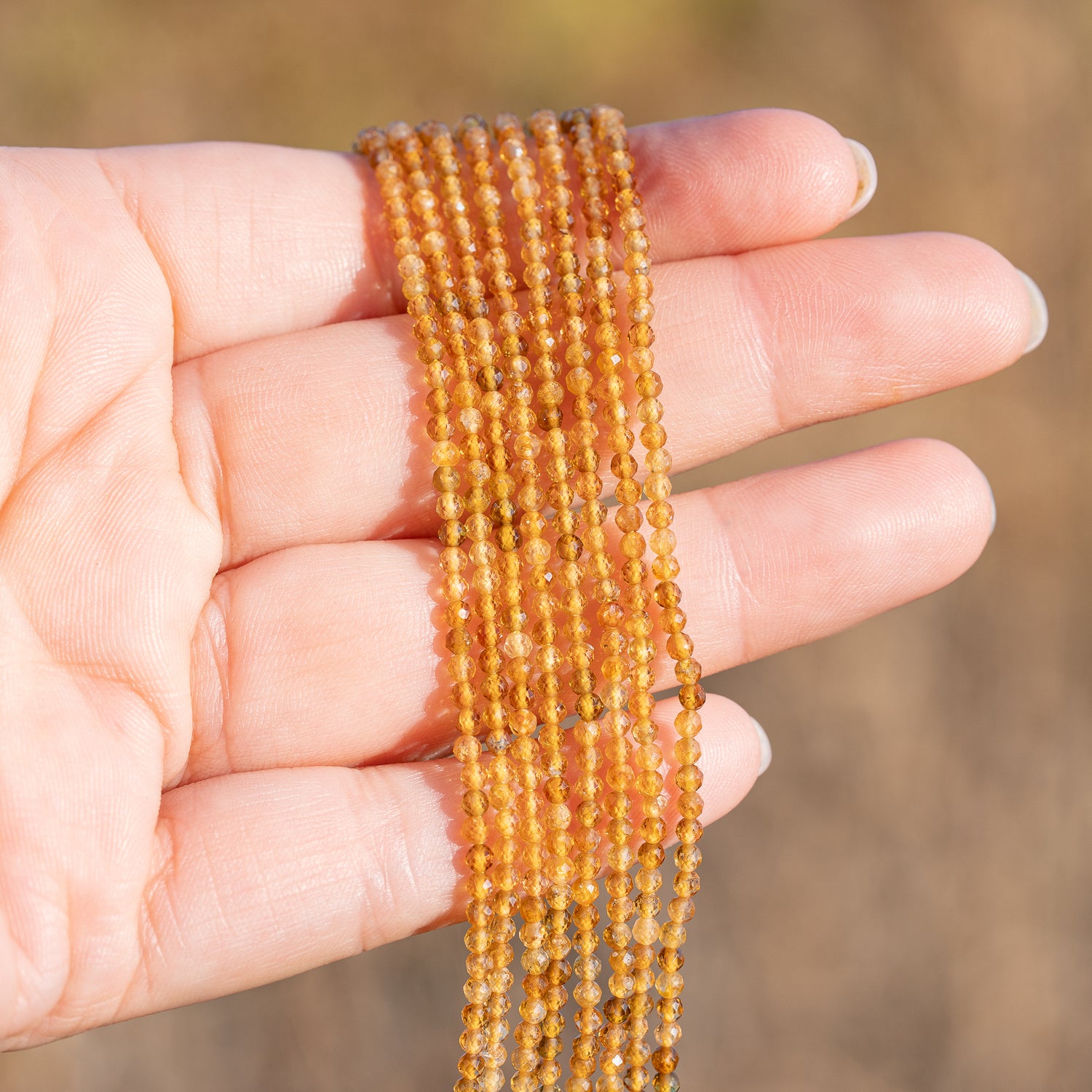 Perles rondes facettes de Tourmaline jaune de 2,5 mm ( rang de env 172 perles )