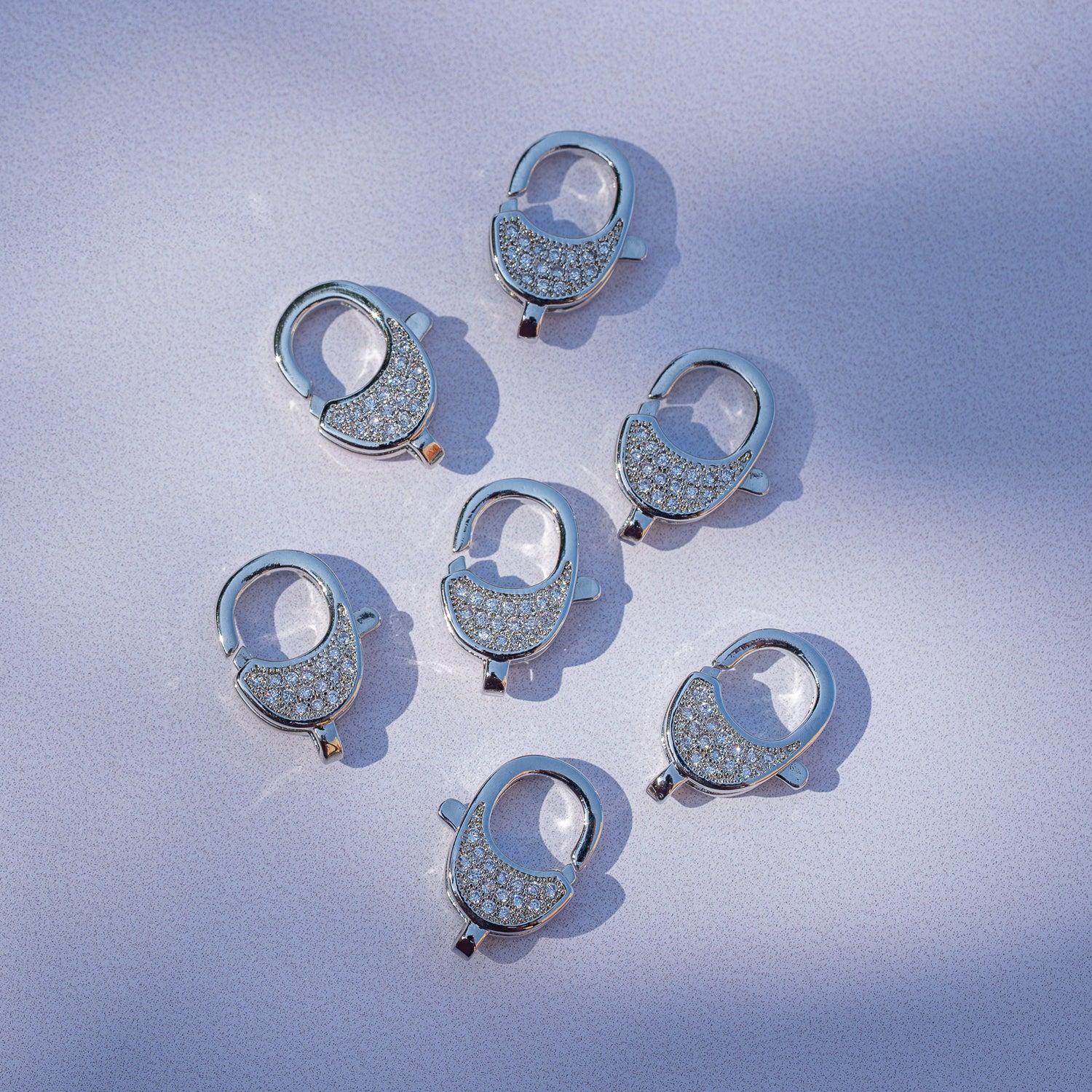 Fermoirs mousqueton ovales en laiton plaqué platine et zirconium de 16,5 mm ( à l&