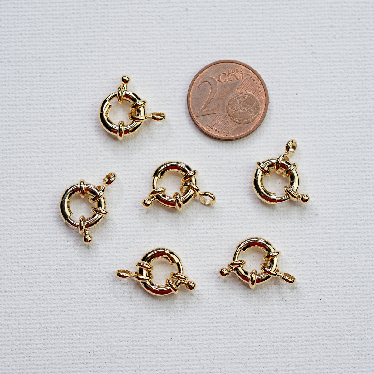 Fermoirs roue en laiton plaqué or 18k de 11 x 2,5 mm ( à l&