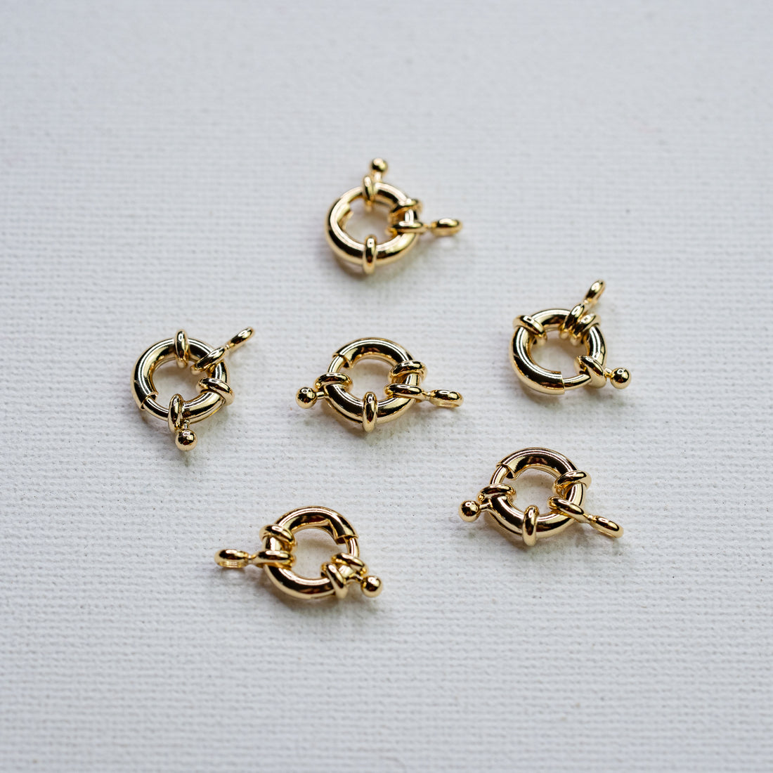 Fermoirs roue en laiton plaqué or 18k de 11 x 2,5 mm ( à l&