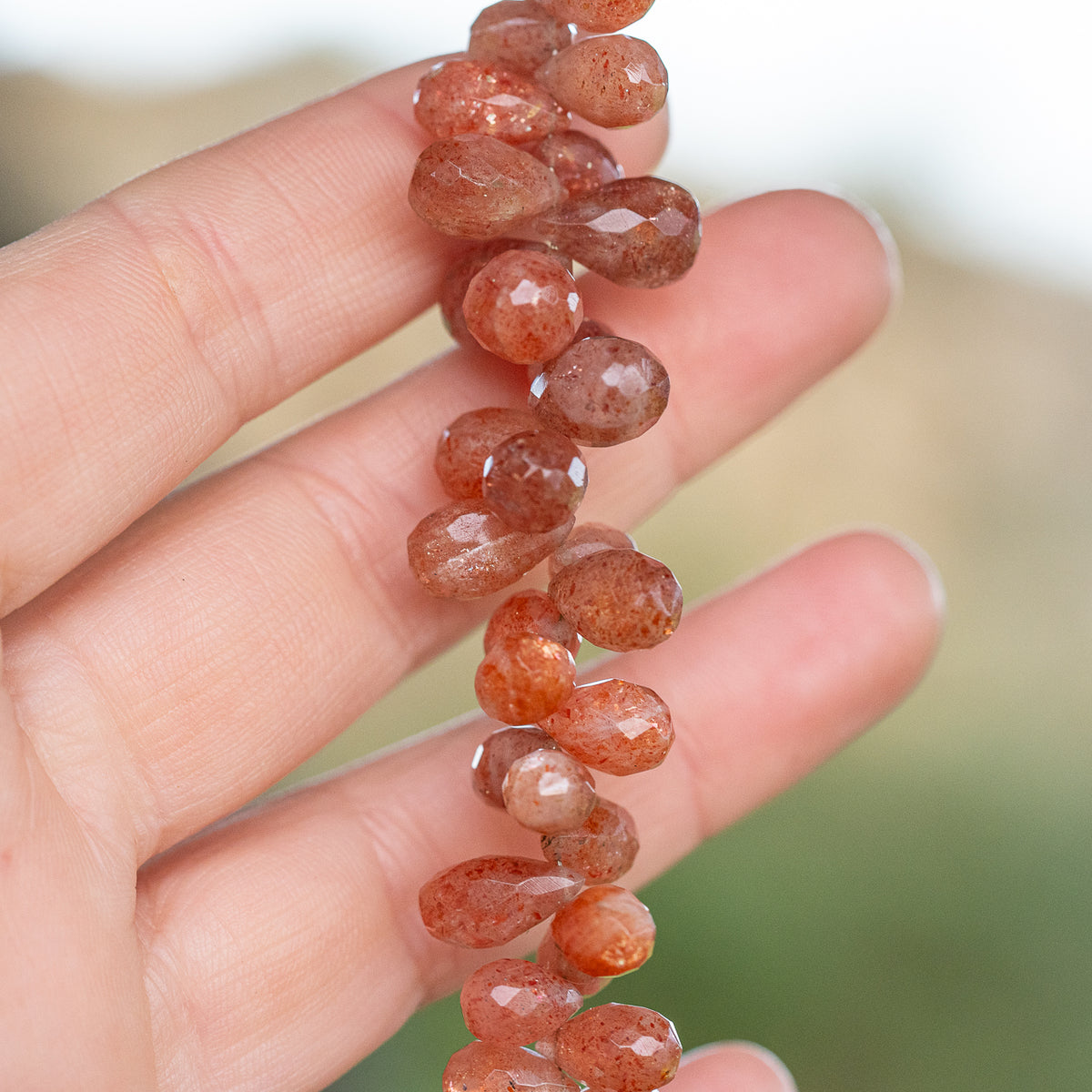 Gouttes facettes de Pierre de soleil de 6/13 mm ( lot de 2 )
