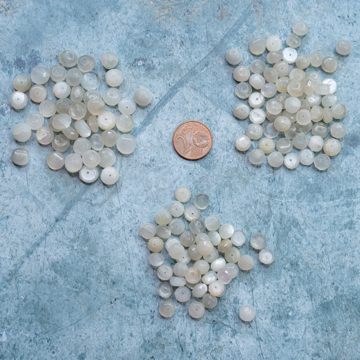 Perles rondelles facettes de Pierre de lune blanche de 7/8,5 mm ( lot de 4 perles )