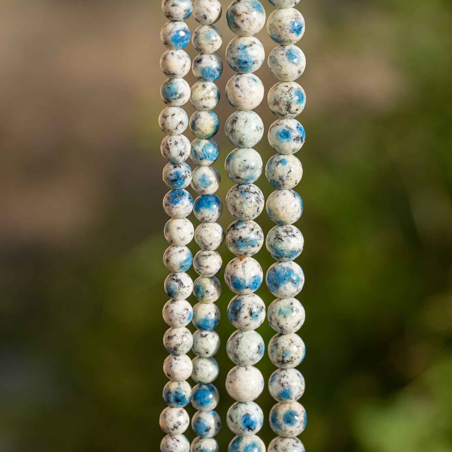 Perles rondes lisses de Jaspe K2 grade AA de 6 ou 8 mm ( 1/2 rang )