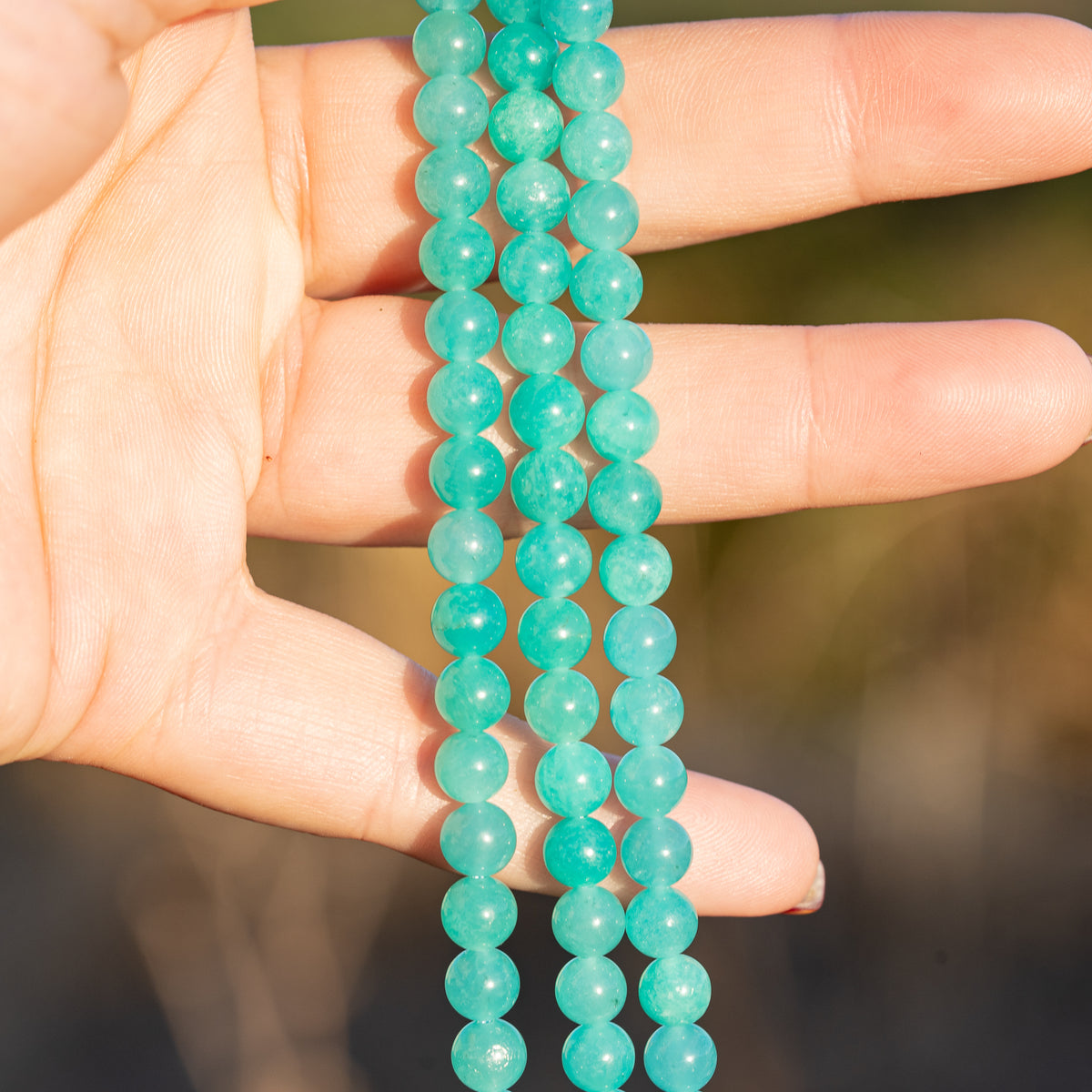 Perles rondes lisses en Amazonite du Pérou de 6,2 mm ( 1/2 rang de env 30 perles )