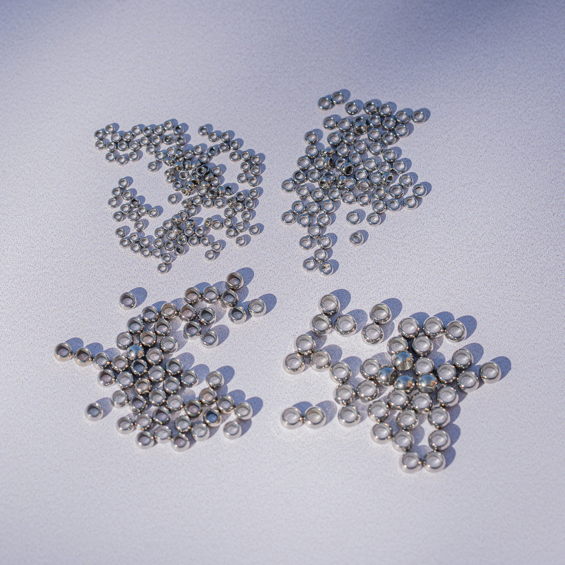 Perles à écraser/sertir en acier inoxydable chirurgical 4 tailles au choix mm ( lot de 4 ou 10 )