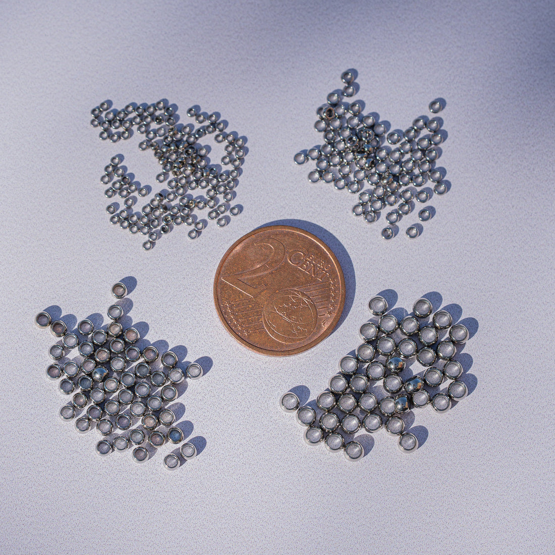 Perles à écraser/sertir en acier inoxydable chirurgical 4 tailles au choix mm ( lot de 4 ou 10 )
