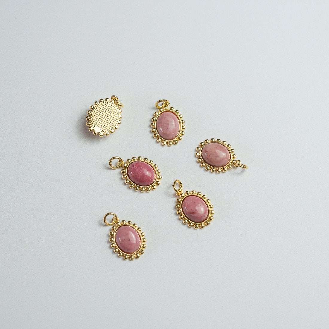 Breloques ovales en laiton plaqué or 18k et Rhodonite de 16 mm ( à l&