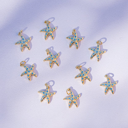 Breloques étoiles de mer en laiton plaqué or 18k et zirconium bleu de 14 mm ( à l&