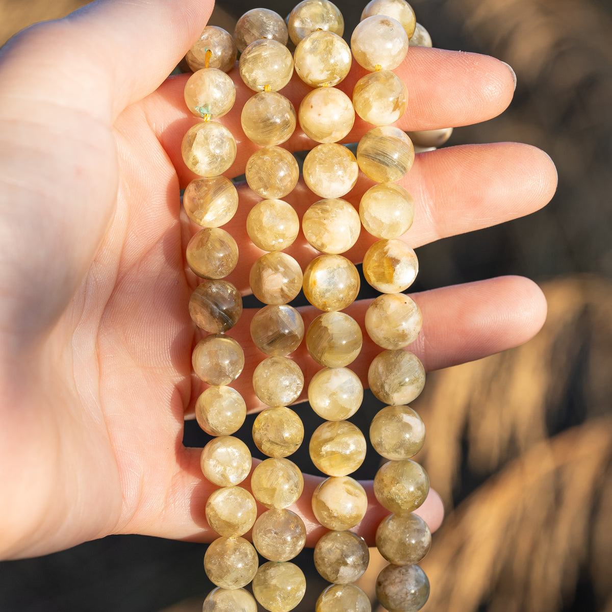 Perles rondes lisses de Lépidolite jaune de 10/10,5 mm ( lot de 4 perles )