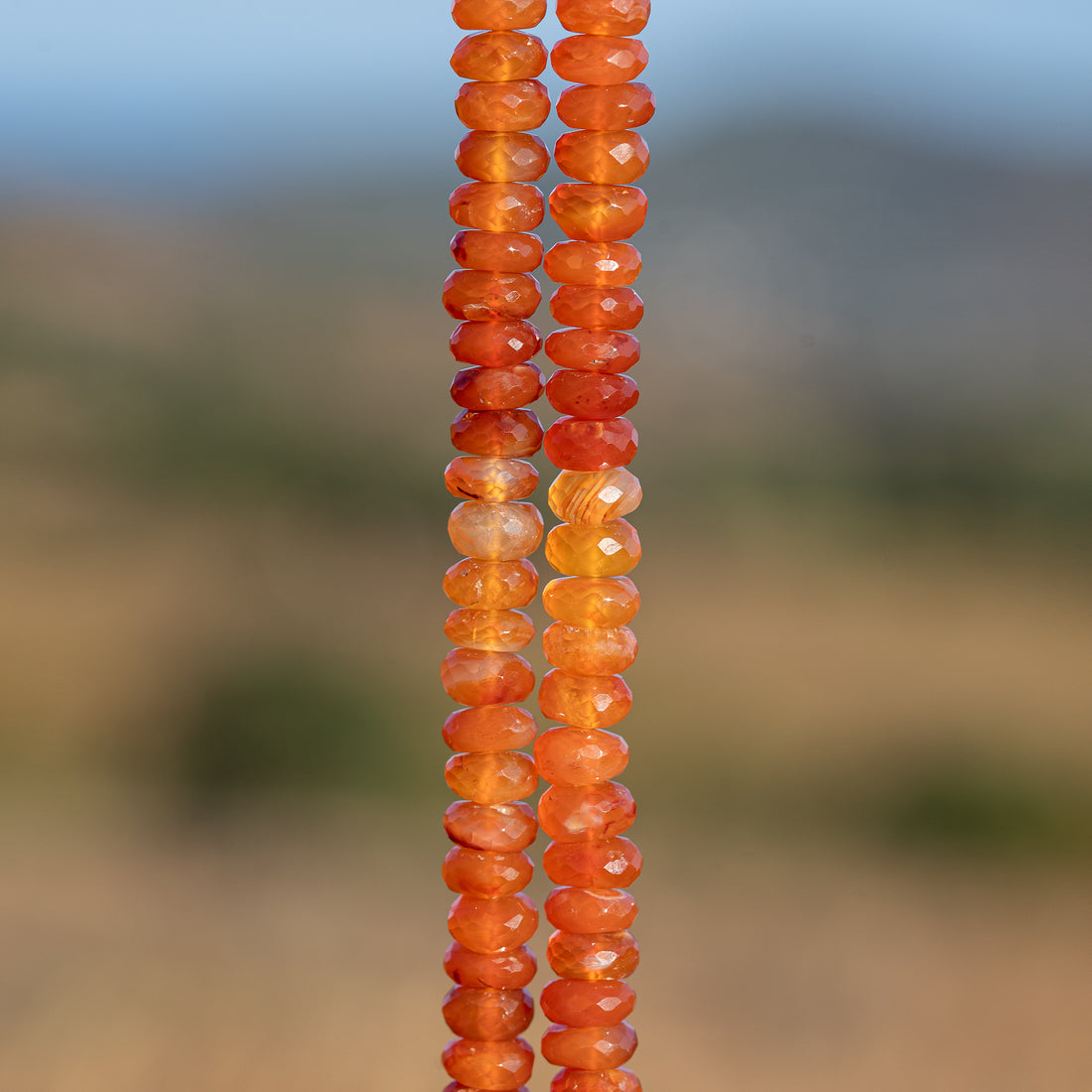 Perles rondelles facettes de Cornaline de env 6,5 mm ( lot de 4 perles )