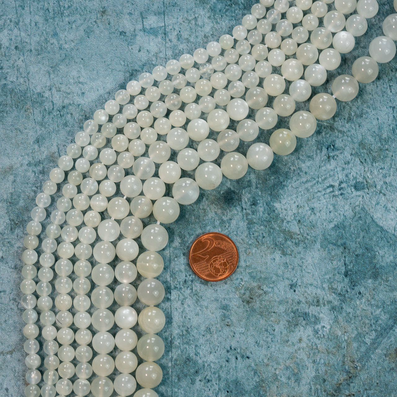 Perles rondes lisses de Pierre de lune blanche de 5,5 à 10 mm au choix  ( Rang, 1/2 rang ou lot )