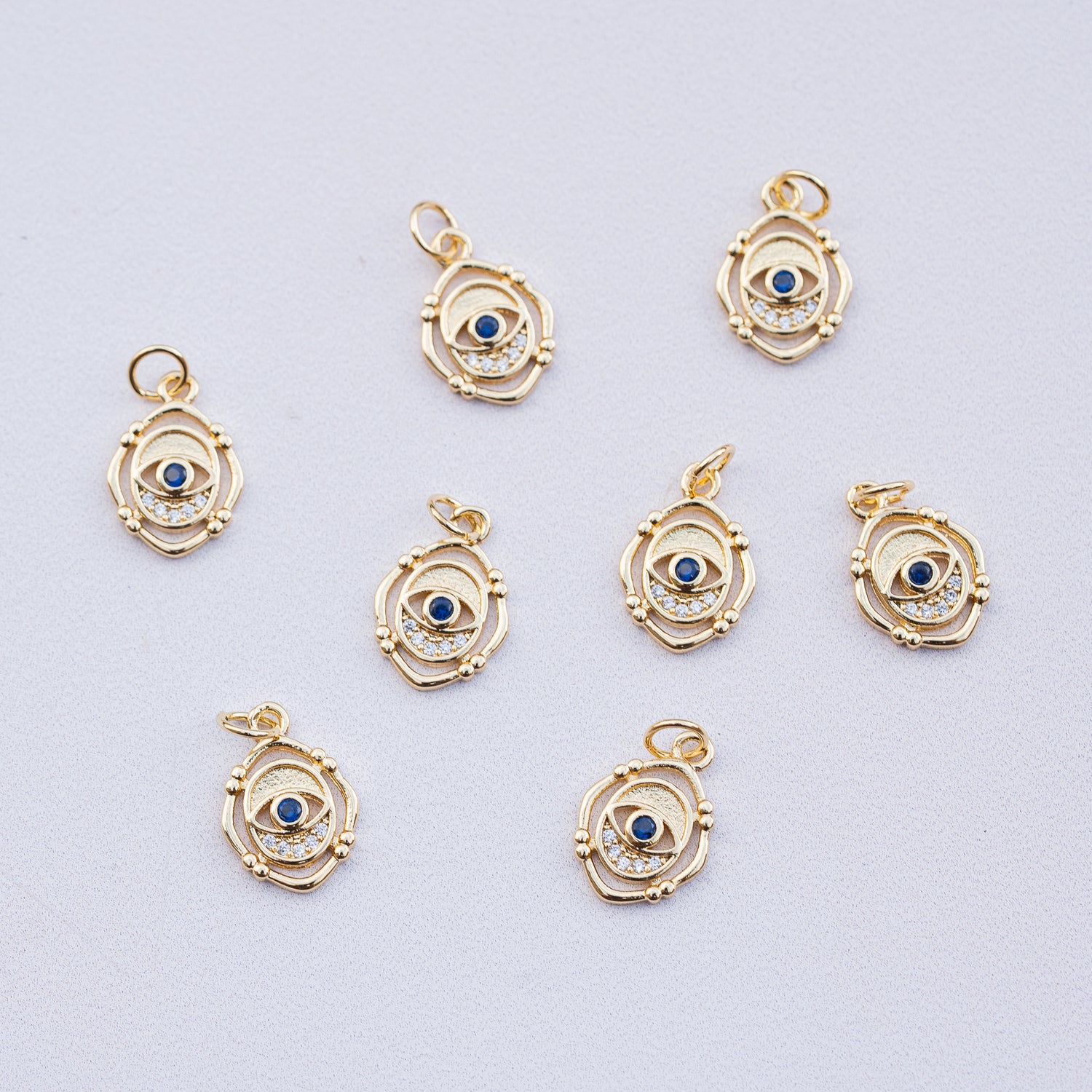 Breloques oeil en laiton plaqué or 18k et zirconium de 15 mm ( à l&