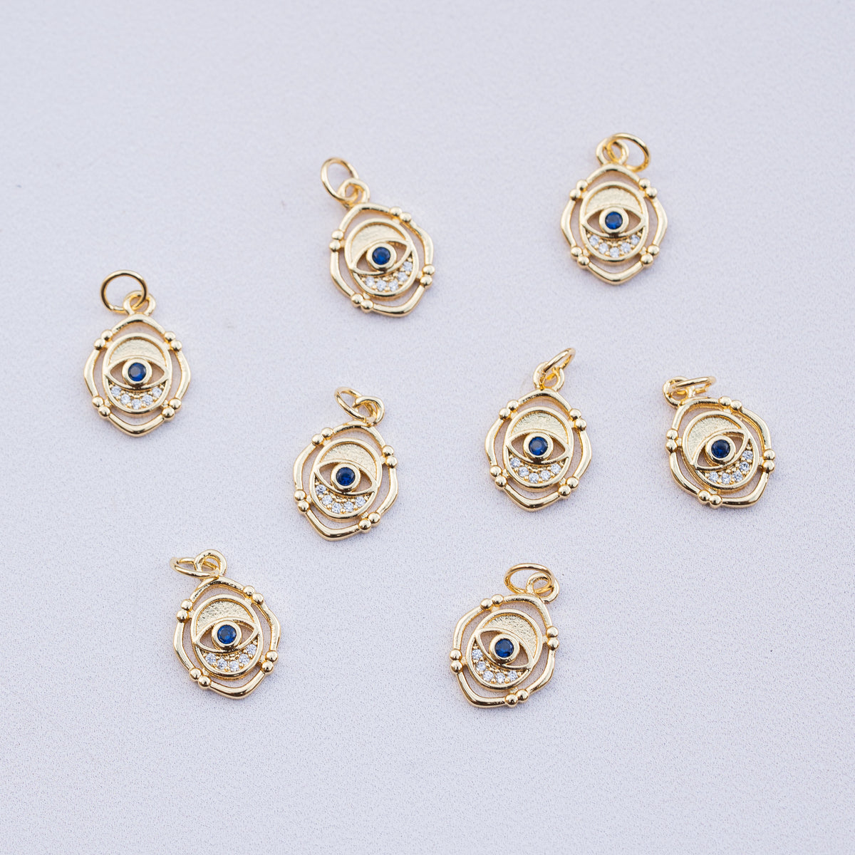 Breloques oeil en laiton plaqué or 18k et zirconium de 15 mm ( à l&