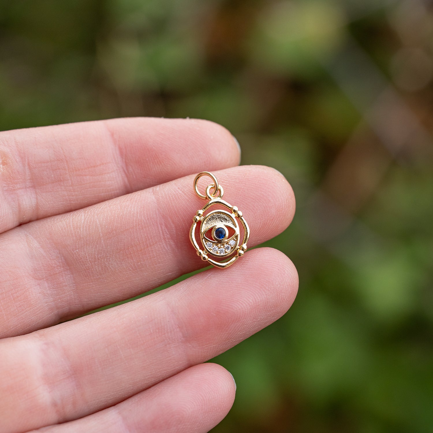 Breloques oeil en laiton plaqué or 18k et zirconium de 15 mm ( à l&