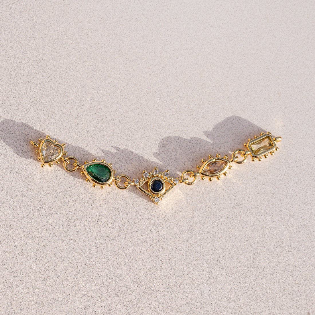 Breloque connecteur oeil/coeur/goutte en laiton plaqué or 18k et zirconium colorés de 58 mm ( à l&