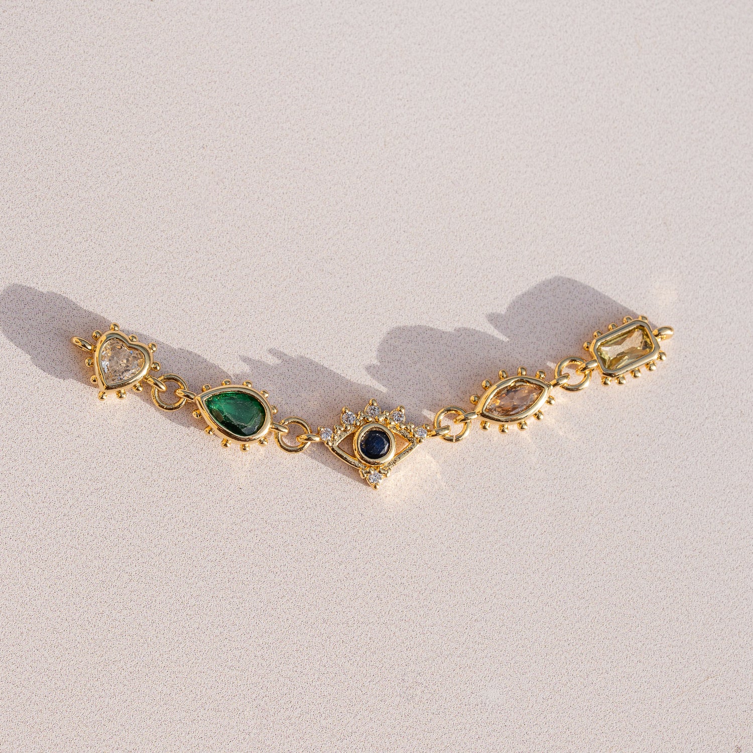 Breloque connecteur oeil/coeur/goutte en laiton plaqué or 18k et zirconium colorés de 58 mm ( à l&