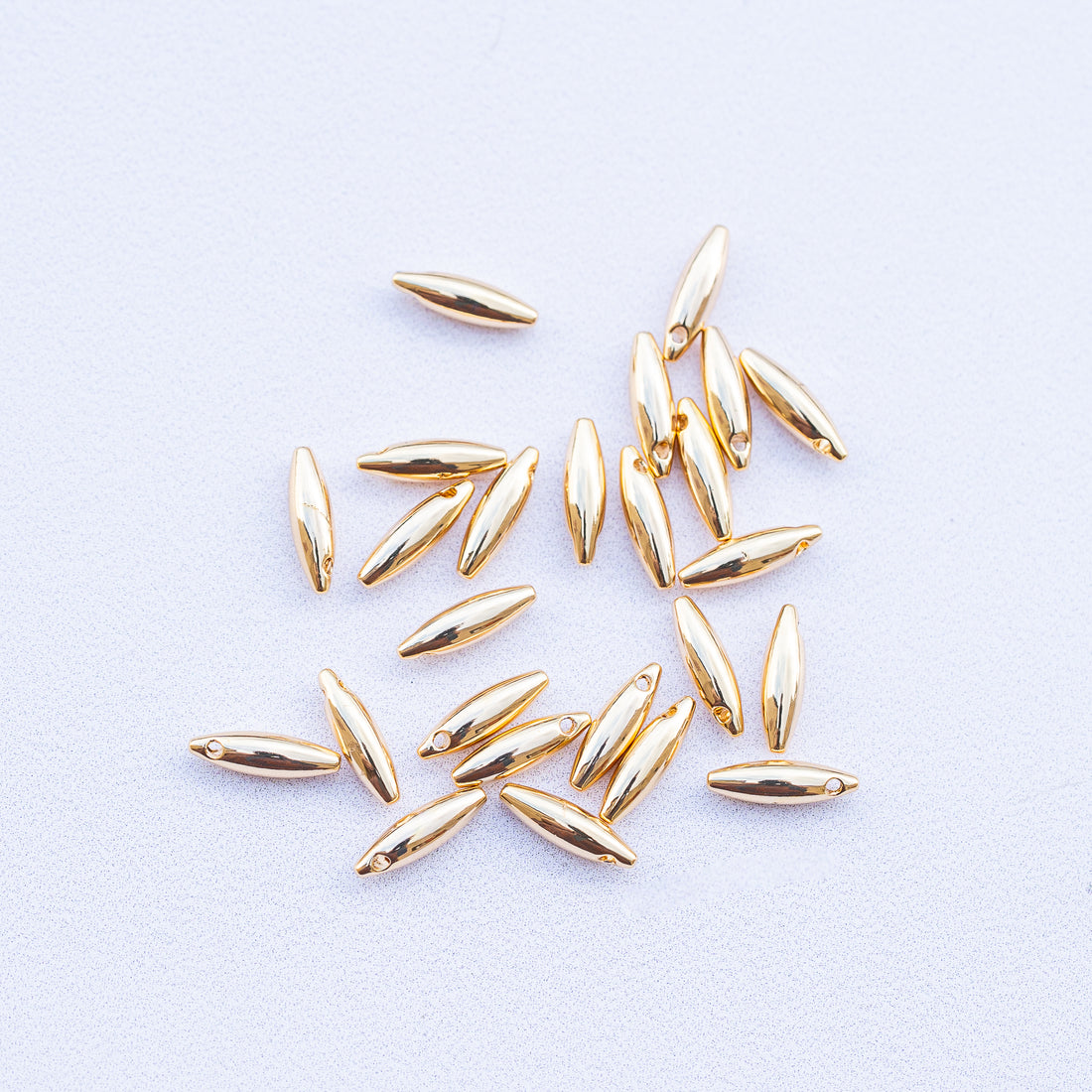 Petites breloques ovale/riz en laiton plaqué or 18k de 10 mm ( à l&
