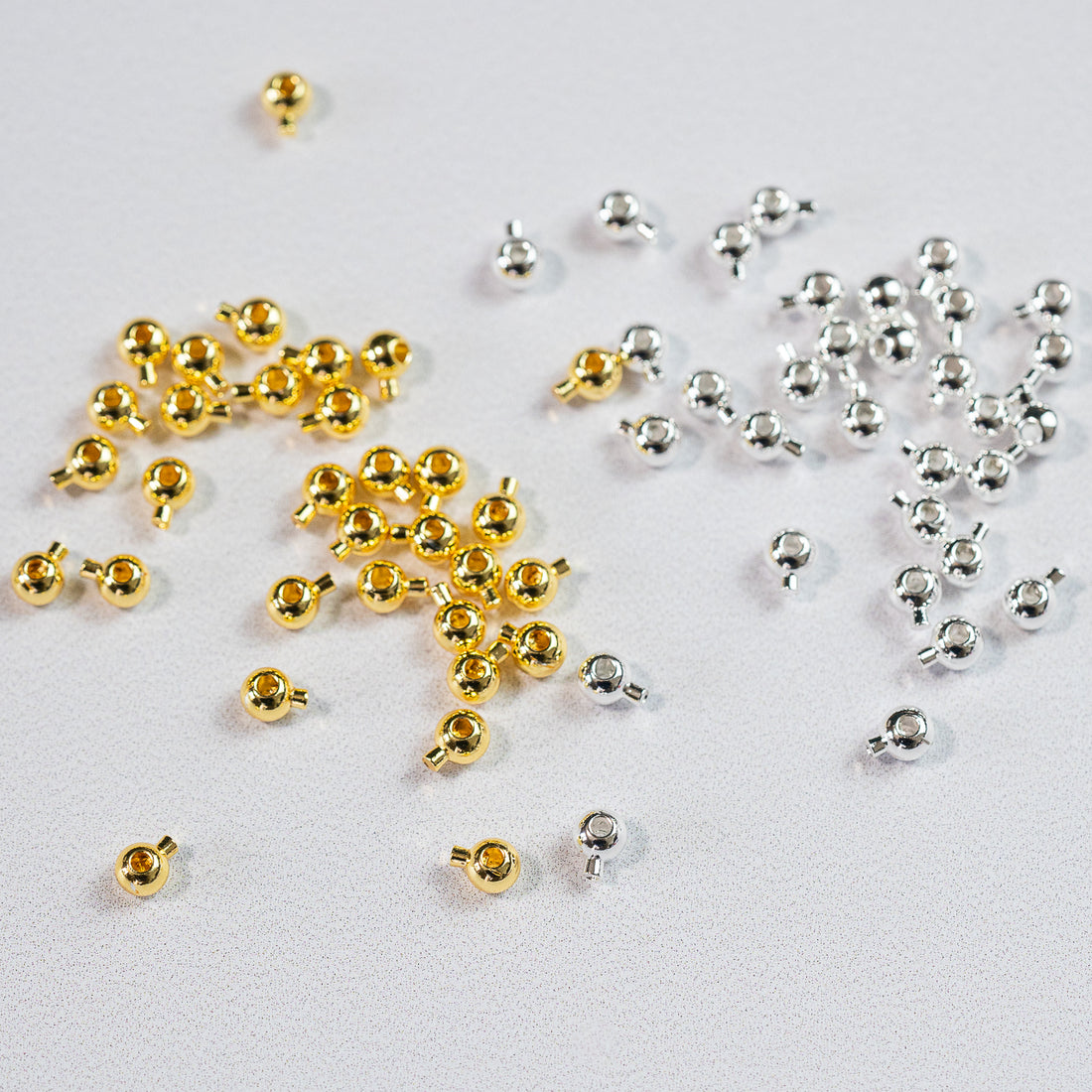 Perles à écraser rondes 2 en 1 bijoux sur câble laiton plaqué or ou argentées de 3 mm ( lot de 4 )