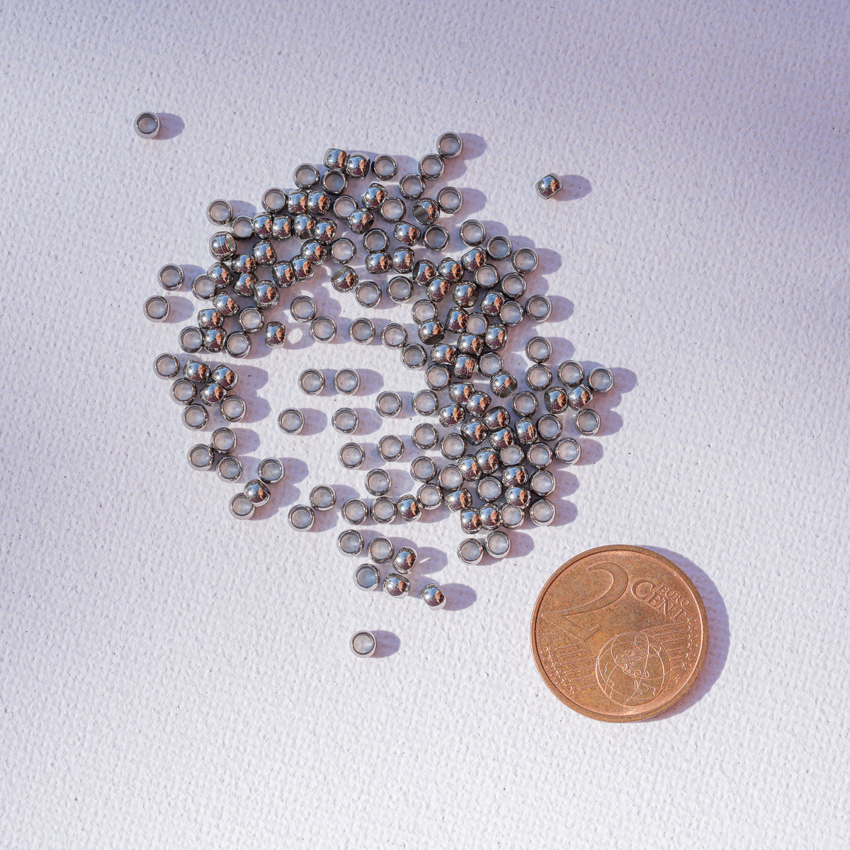 Perles rondelles lisses acier inoxydable couleur acier de 3 x 2 mm ( lot de 10 )