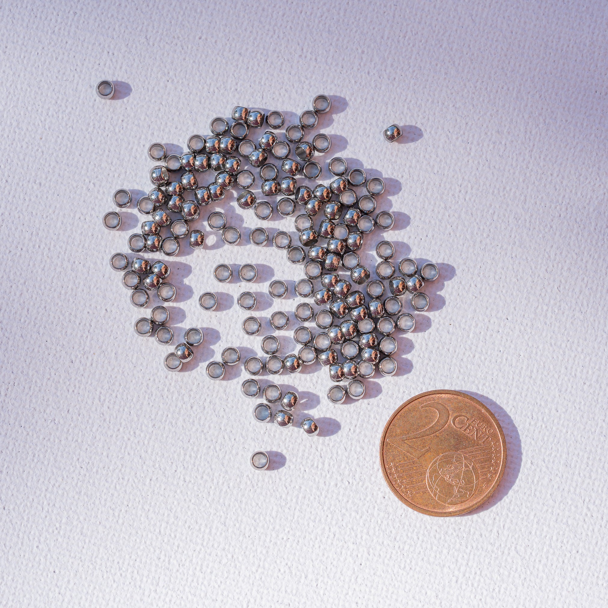 Perles rondelles lisses acier inoxydable couleur acier de 3 x 2 mm ( lot de 10 )