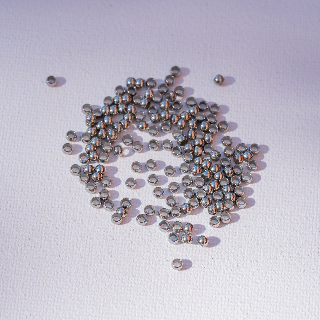 Perles rondelles lisses acier inoxydable couleur acier de 3 x 2 mm ( lot de 10 )