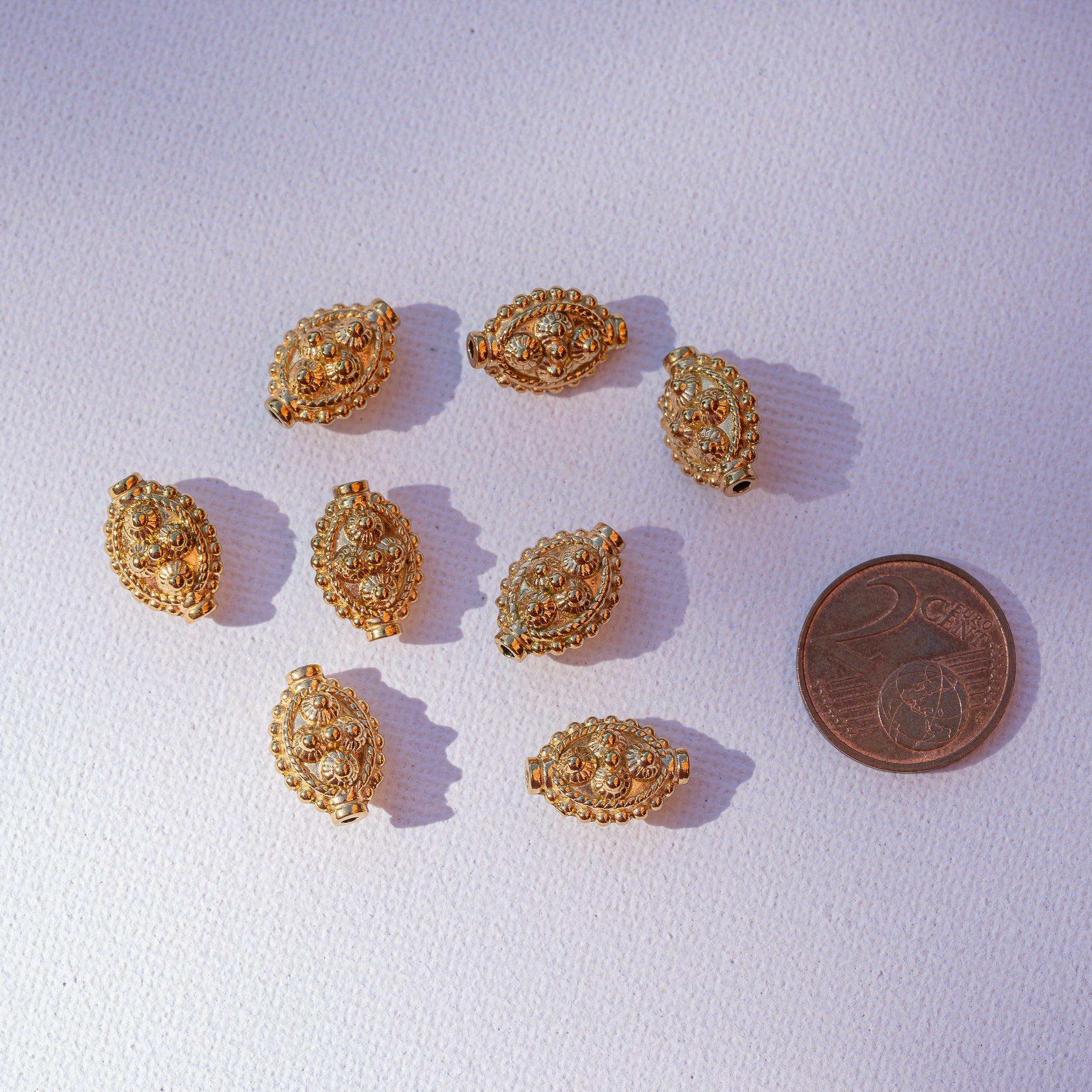 Perles ovales travaillées en acier inoxydable plaqué or de 14 x 10 x 7 mm ( à l&