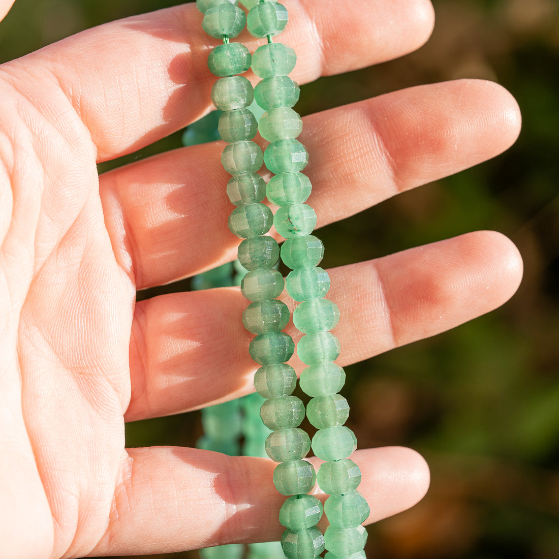 Perles rondelles facettes lanternes/citrouilles en Aventurine de 8 x 5 mm ( 1/2 rang de env 34 perles )