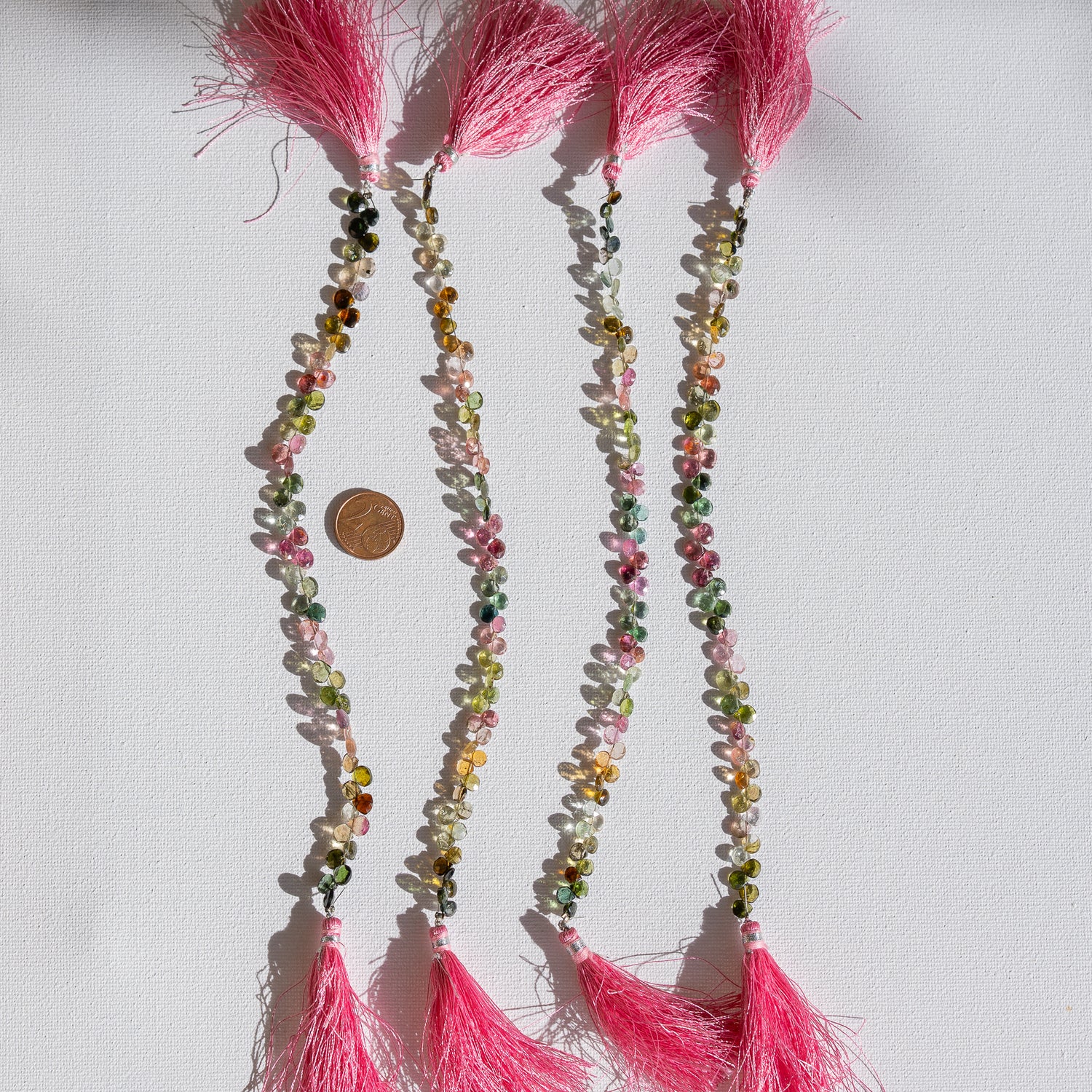 Fil de 20 cm et env 56/62 perles gouttes facettes de Tourmaline multicolore de env 4/6 mm