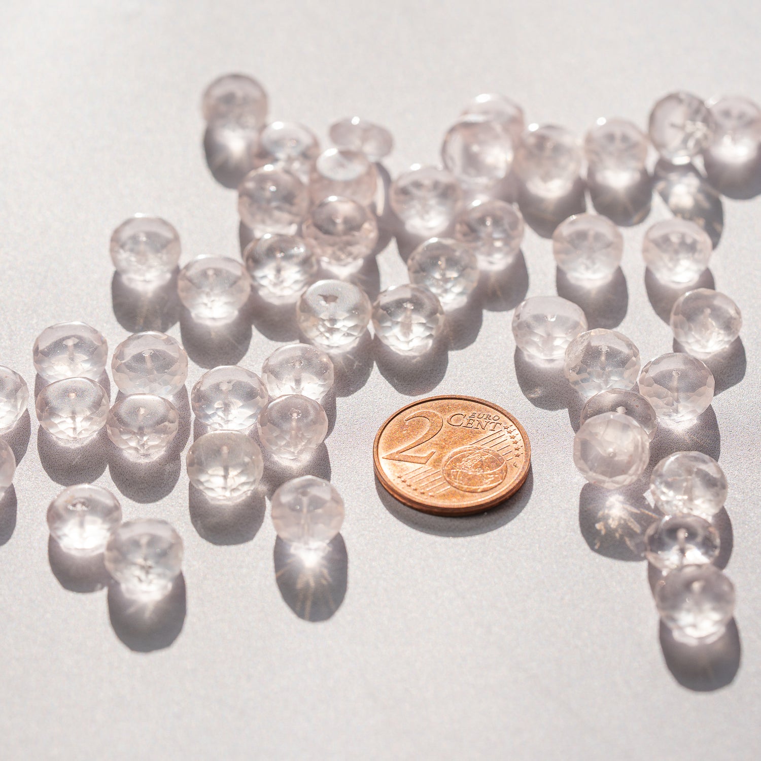 Perles rondelles facettes de quartz rose de env 8/9 mm ( lot de 4 )