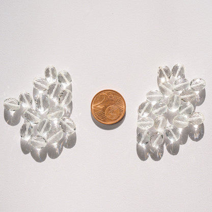 Perles ovales facettes de cristal de roche de env 8/9 mm ( à l&