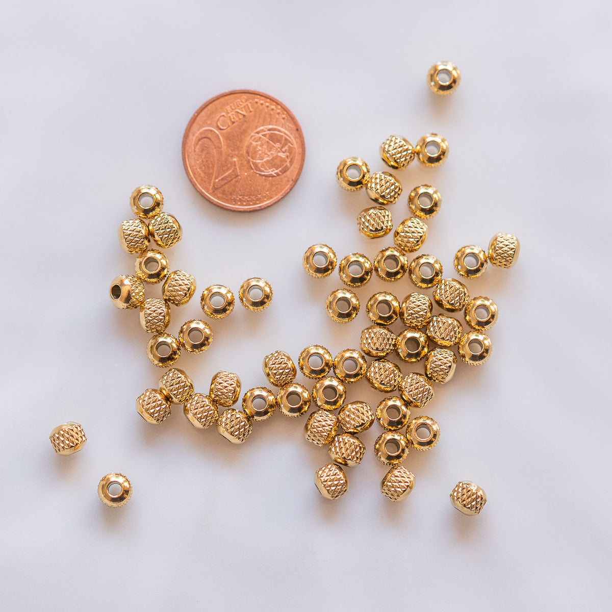 Perles rondelles striées en acier inoxydable plaqué or de 5 x 4 mm ( lot de 2 )
