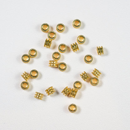 Perles rondelles striées en laiton plaqué or 18k de 6 x 4 mm ( lot de 2 )
