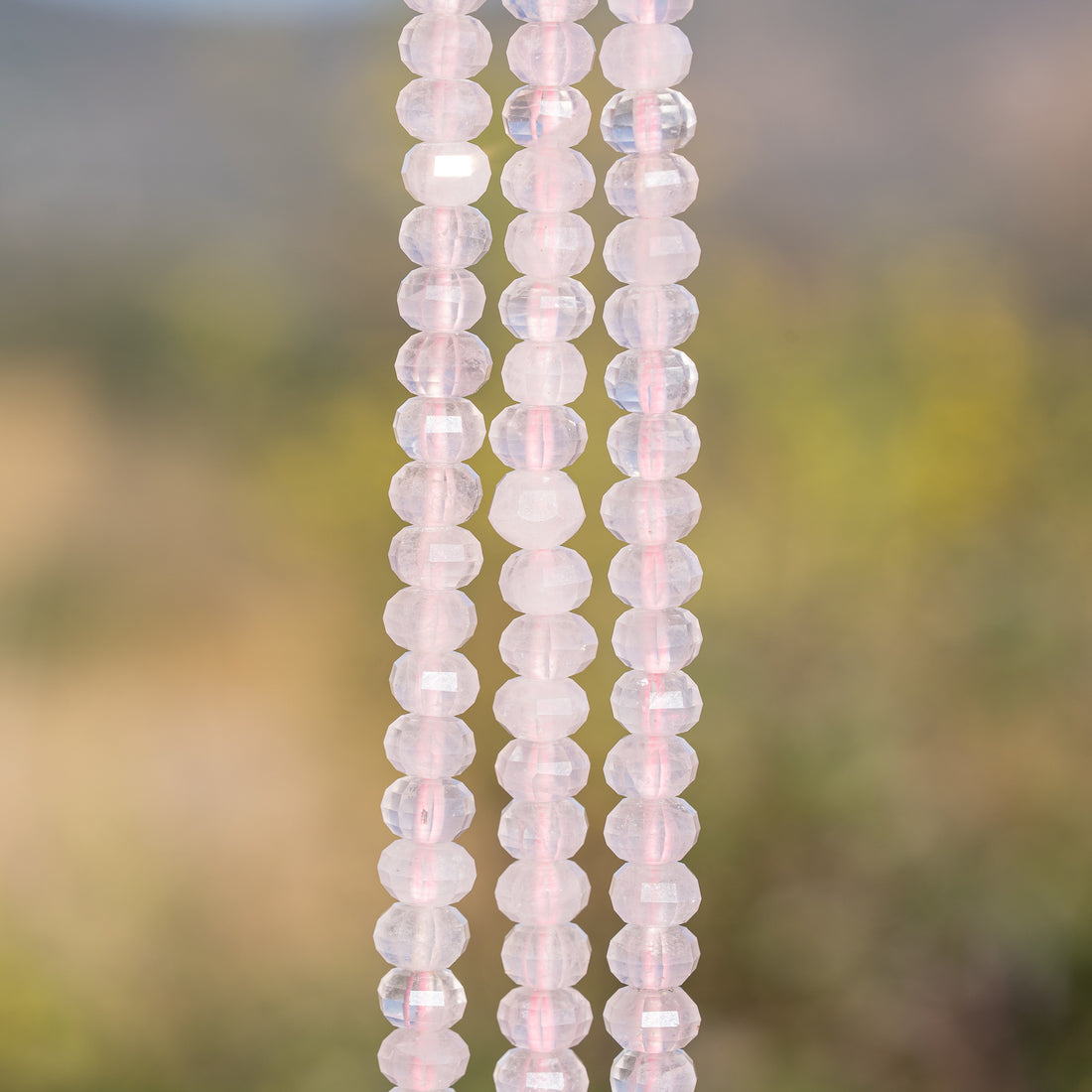 Perles rondelles facettes lanternes/citrouilles de Quartz rose de 8 x 5 mm ( 1/2 rang de env 34 perles )