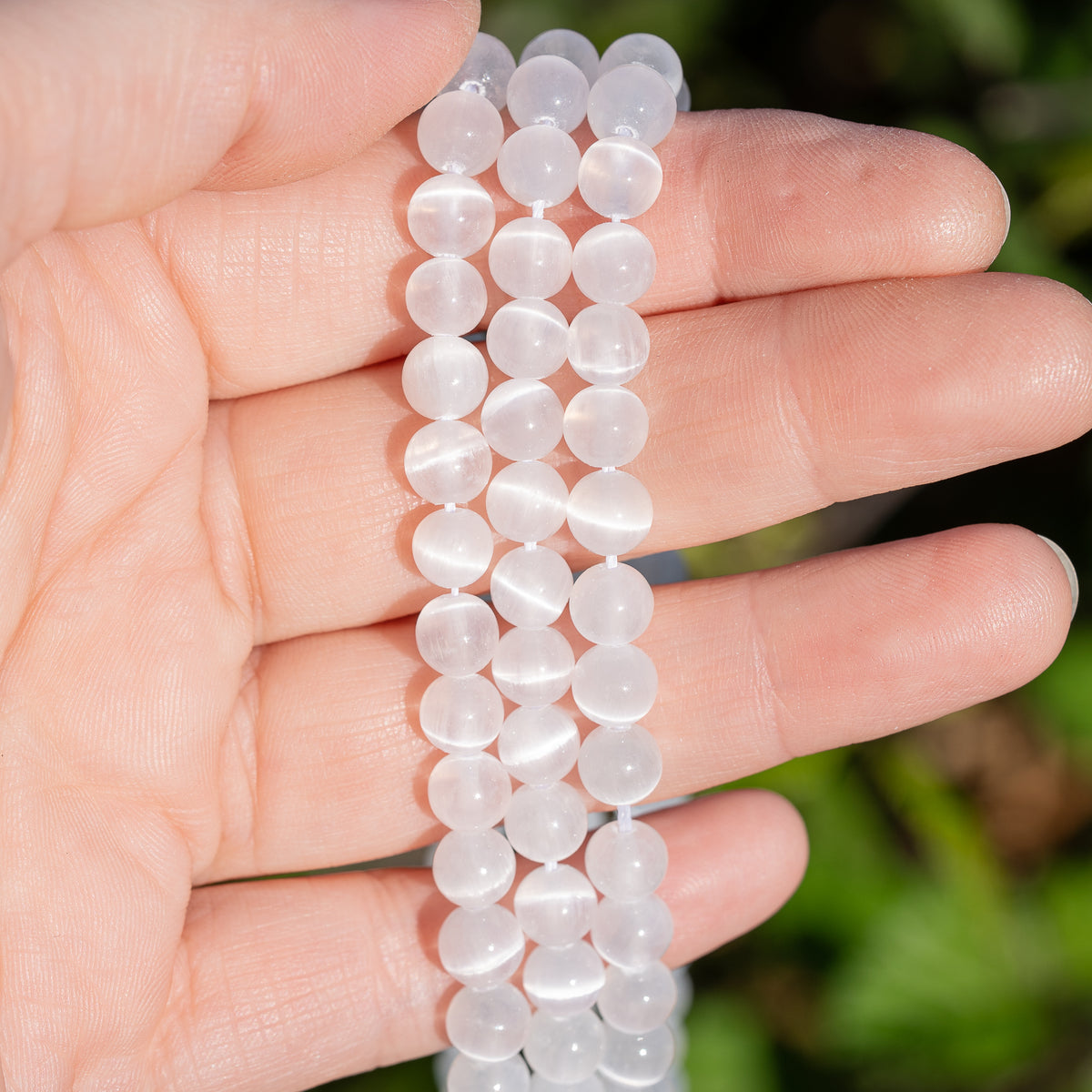 Perles rondes lisses de Sélénite de 6,5 mm ( rang de env 60 perles )